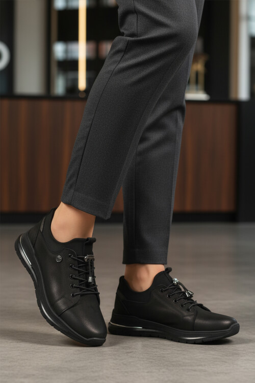 حذاء نسائي كاجوال برباط مطاطي من جلد النوبوك الأسود 5004 Z